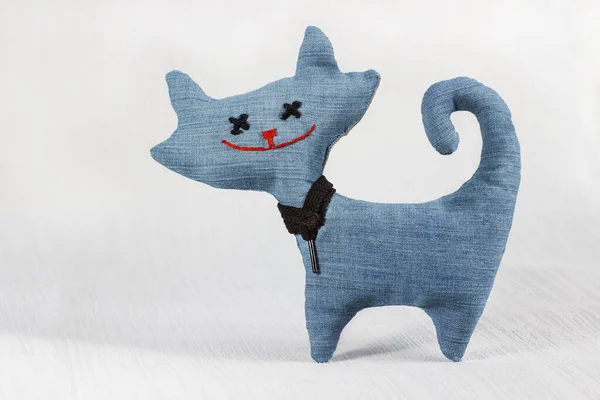 DIY toy cat made of blue jeans fabric
