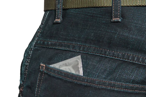 Condom in the back pocket of blue men's jeans