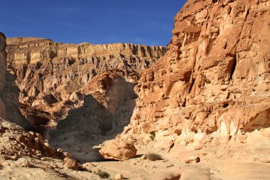 Egypt, Sinai Peninsula. Landscape in the color canyon. Red rocks and blue sky. Big rocky mountains. Egipedes landscape. Protected zone.