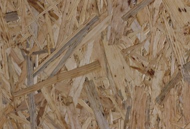 Oriented strand board. Wooden house. Building materials. Eco home Durable wooden floor. Material for interior decoration.