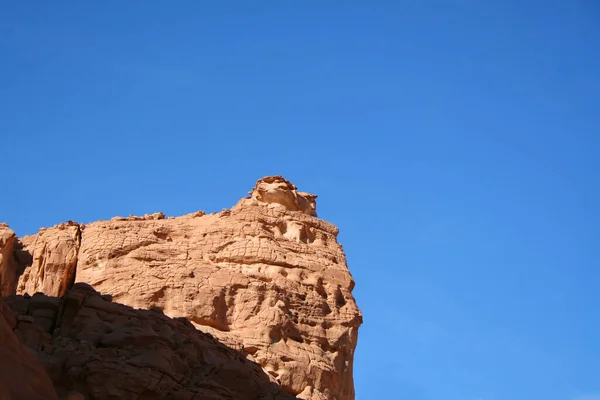 Egypt, Sinai Peninsula. Landscape in the color canyon. Red rocks and blue sky. Big rocky mountains. Egipedes landscape. Protected zone.