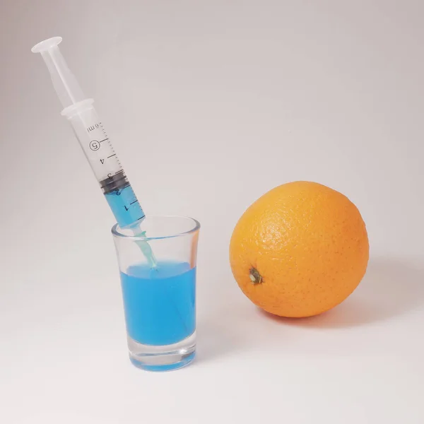 Sweet orange. Laboratory tests. Injection of toxin into an orange. 