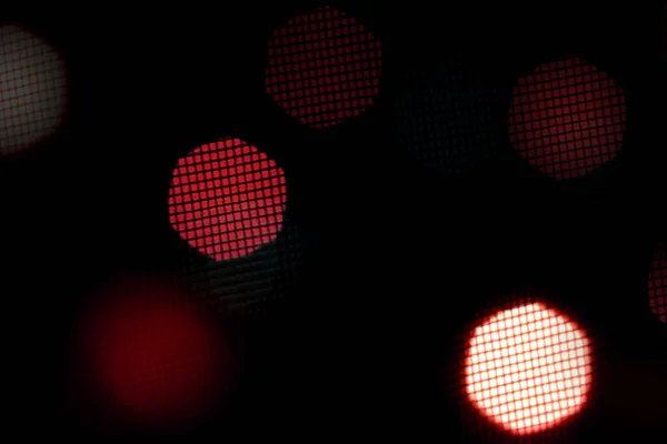 Colorful. Circular points. Blurred bright light. Defocused background. Bokeh abstract texture. 