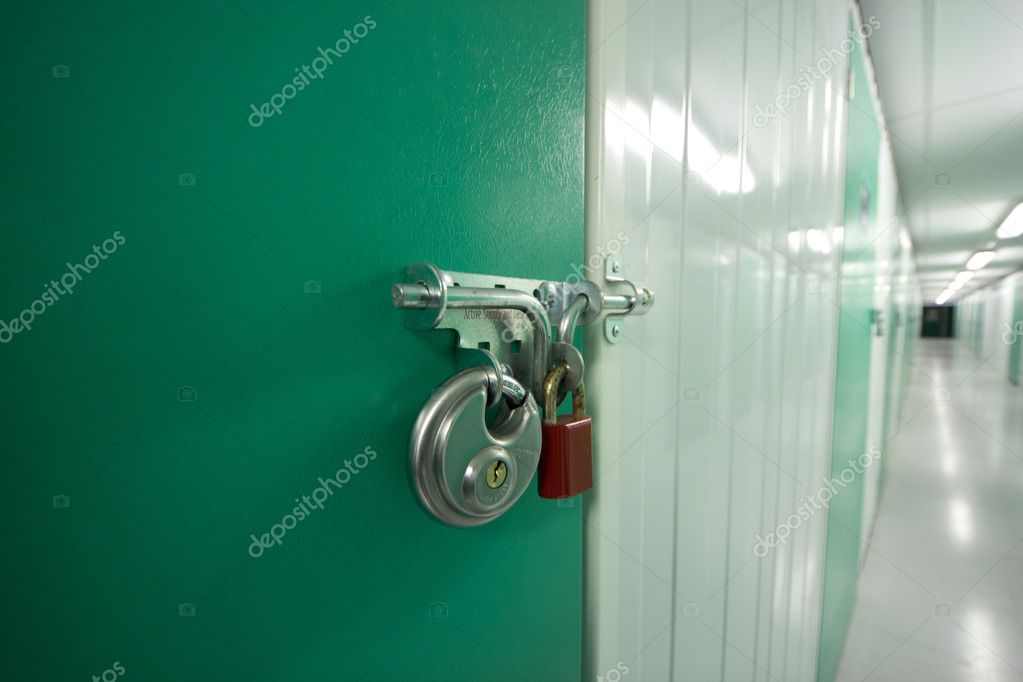 Double Locks On A Self Storage Unit Stock Photo By Jsantti 22869878 Double Locks On A Self Storage Unit, How To Lock A Storage Unit Door