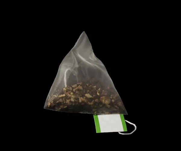 Luxury Pyramid Teabag isolated on Black — Stock Photo, Image