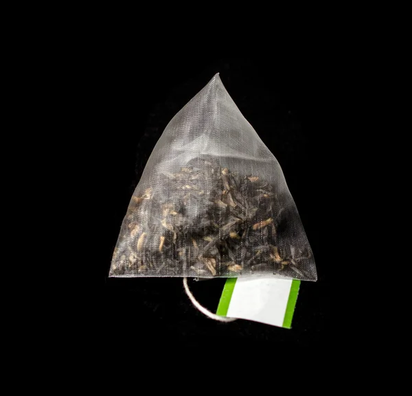 Luxury Pyramid Teabag isolated on Black — Stock Photo, Image