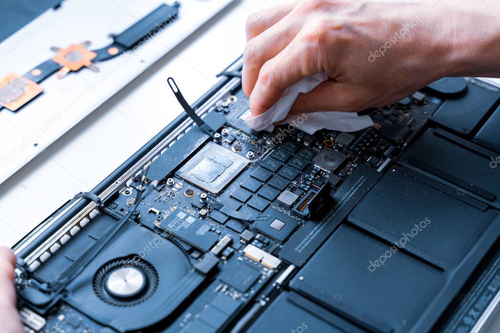 Computer diagnostics. Maintenance repair engineer support. Pc technician service with laptop on hardware background. Electronic technology development concept