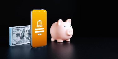 Mobil bankacılık uygulaması. İnternet banka uygulamalı cep telefonu. Siyah arka planda 100 dolarlık banknot. Para biriktir iş cüzdanı