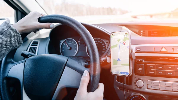 Gps car map system. Global positioning system on smartphone screen in auto car on travel road. Navigation auto location system app