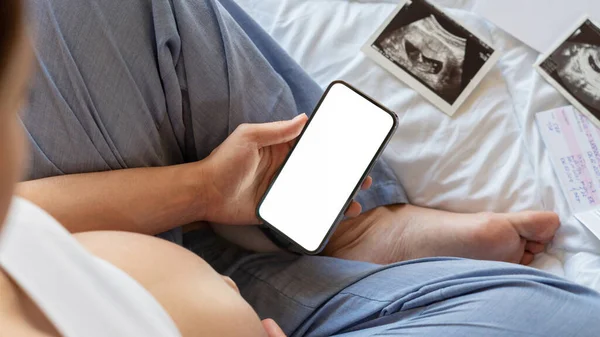 Pregnancy device mockups. Mobile pregnancy online maternity application. Pregnant mother using phone mock up. Pregnancy, medicine, pharmaceutics, health care and people concept