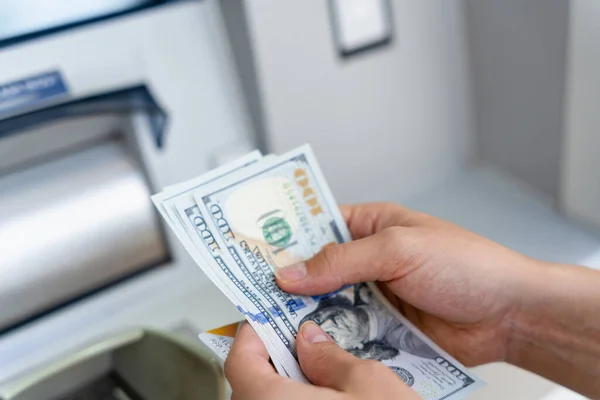 Atm machine money cash. Holding american bill cash. Woman withdraw money usd hundred dollar. Us dollar bill, bank credit card