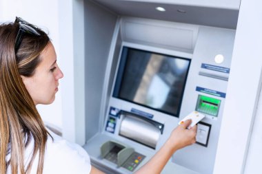 Atm machine money cash. Holding american bill cash. Woman withdraw money usd hundred dollar. Us dollar bill, bank credit card