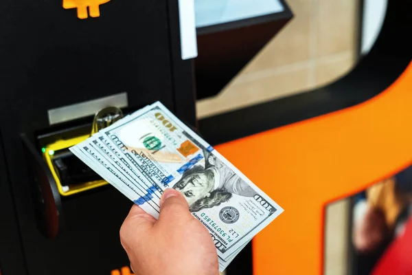 Atm cash bitcoin teller machine. Woman withdraw american dollar bill money. Usd hundred money payment on virtual crypto currency btc wallet. Bitcoin BTC ATM Cash Machine