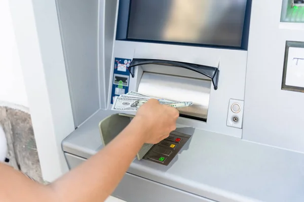 Atm money cash machine. Woman withdraw money bill. Holding american hundred dollar cash. Bank credit card, us dollar