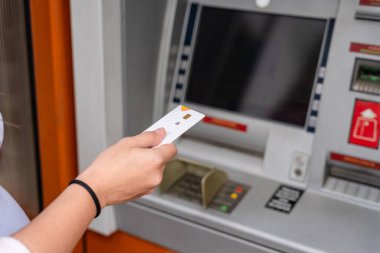 Atm machine screen. Hand holding money bank credit card. Withdraw money cash from atm. Money stack, bank credit card