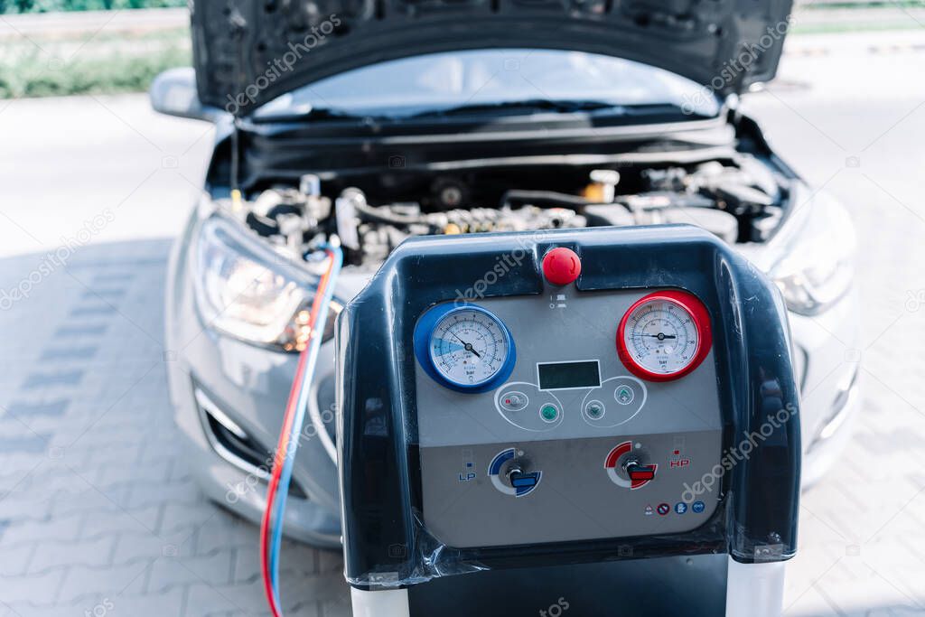 Car air condition ac repair service. Refill automobile ac compressor and checking auto conditioning system. Auto car conditioner diagnostic