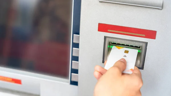 Atm machine money. Hand holding money bank credit card. Withdraw money cash from atm. Us dollar bill, bank credit card