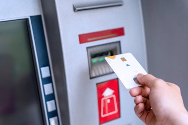 Atm machine money. Hand holding money bank credit card. Withdraw money cash from atm. Us dollar bill, bank credit card