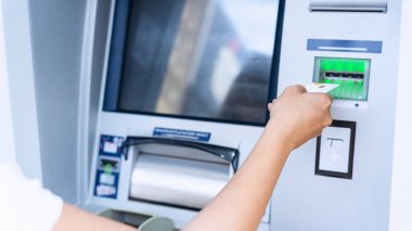 Atm money cash machine. Woman withdraw money bill. Holding american hundred dollar cash. Bank credit card, us dollar