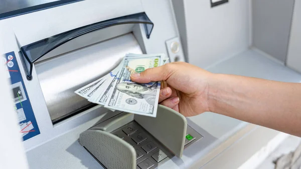 Atm machine money cash. Woman withdraw money bill. Holding american hundred dollar cash. Bank credit card and dollar bill