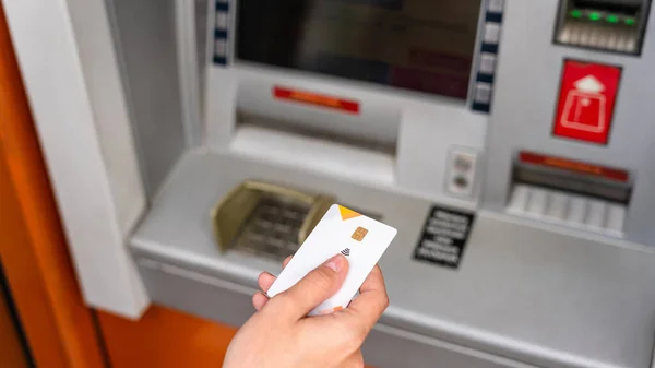 Atm cash machine. Money bank credit card holding hand. Withdraw money cash from atm. Money dollar, bank credit card