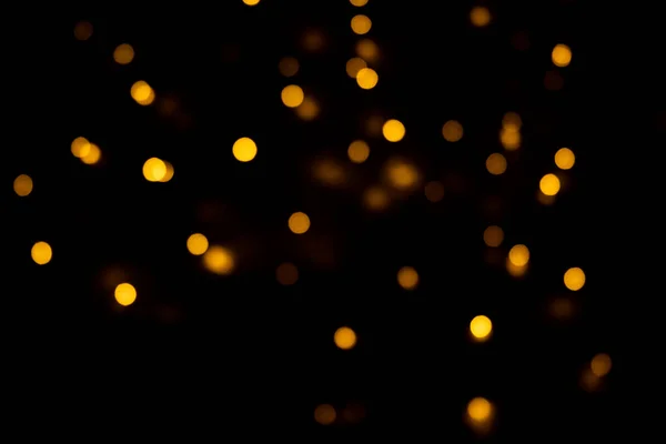 Bokeh Gouden Lichten Achtergrond Wazig Licht Feestelijke Slinger Een Zwarte — Stockfoto