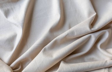 Bej renkli keten kumaş desenleri. Tekstil arkaplanı, üst görünüm, kopyalama alanı