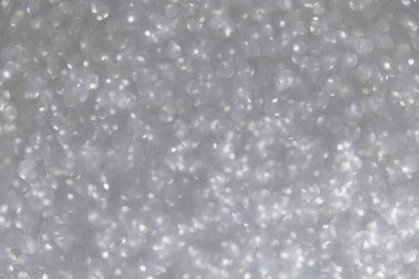 Soyut şenlik arkaplanı. Işıl ışıl gümüş bir doku.