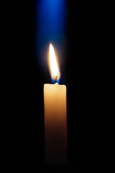Yellow Candle Burning Dark Background Blue Stripe Light Hot Fire — Stok fotoğraf