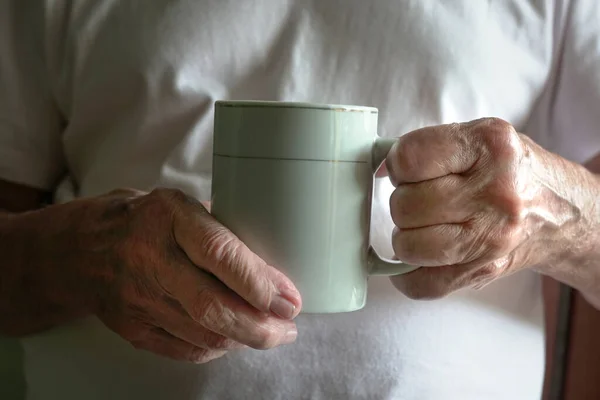 Senior Man Holding Cup Hot Drink Close View His Wrinkled — Stock Photo, Image