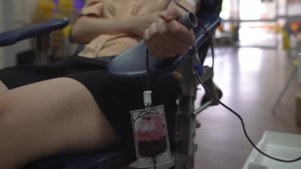Woman Donor Donating Her Blood Clinic Close View Her Hand — Vídeo de Stock