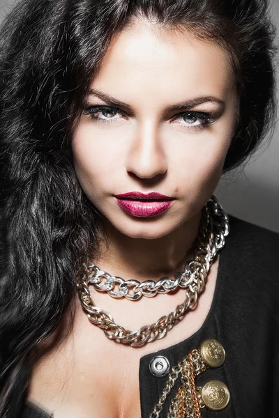 Close-up portrait of hot brunette young woman with demonic look. — Stock Photo, Image