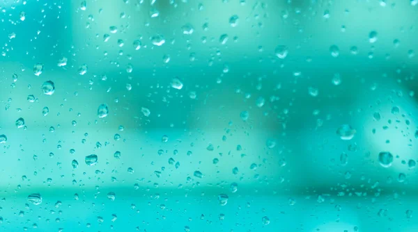 ฝนตกบนพ นหล าเง นเทอร ควอยส โฟก สทางซ — ภาพถ่ายสต็อก