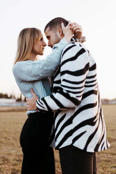 Woman Looking Her Boyfriend Close Couple Nose Kissing Countryside Embraced Royalty Free Stock Photos