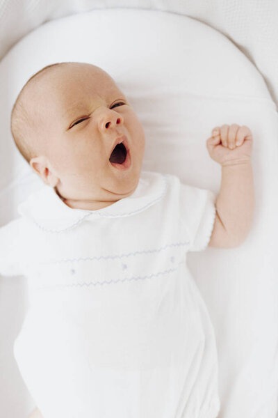 Close Newborn Baby Boy Yawning Crib Open Mouth Vertical Photo Stock Photo