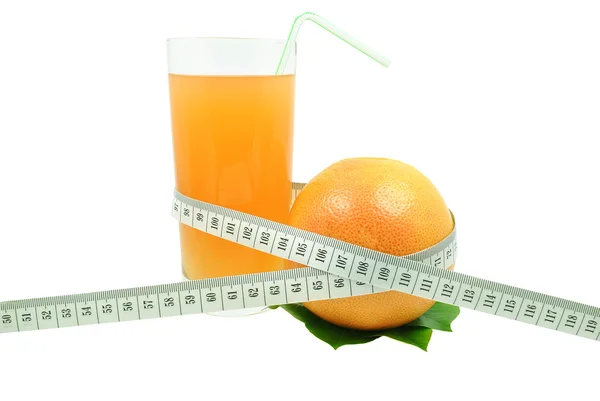 Grapefruitsaft und Messgerät — Stockfoto