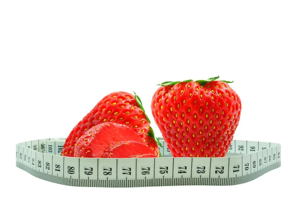 Strawberries and meter Royalty Free Stock Images