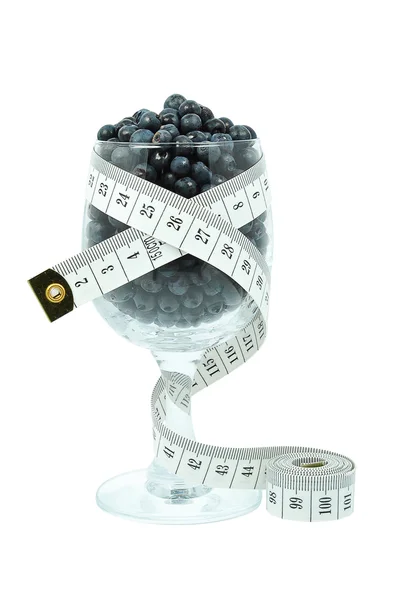 Blueberries in a glass and meter — Stock Photo, Image