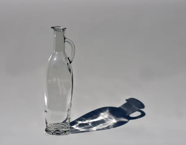 Бутылка с тенью — стоковое фото