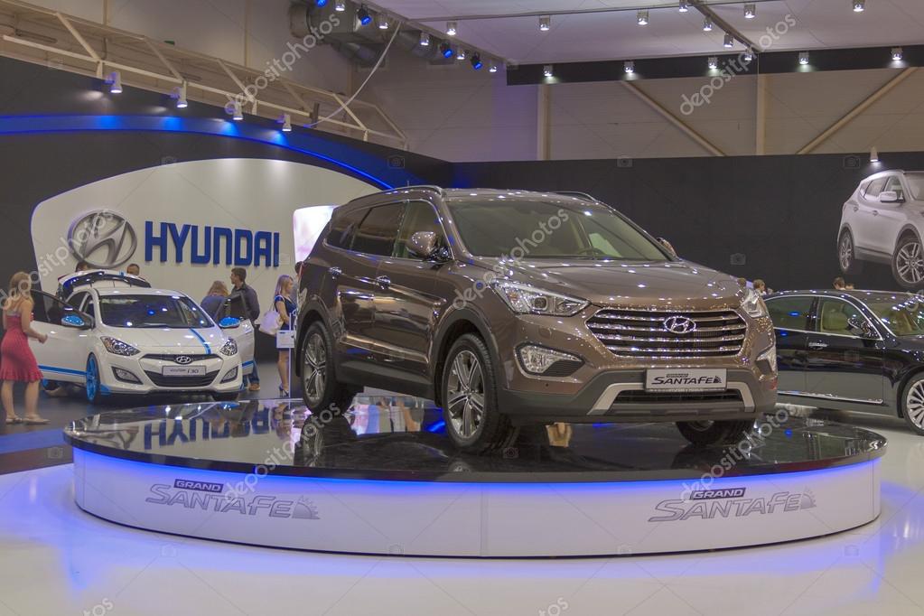 KIEV, UKRAINE - MAY 30: Visitors visit Hyundai booth with new Korean car model SantaFe Grand on display of SIA' 2013 The 21st Kyiv International Motor Show in International Exhibition Centre on May 30, 2013 in Kiev, Ukraine.