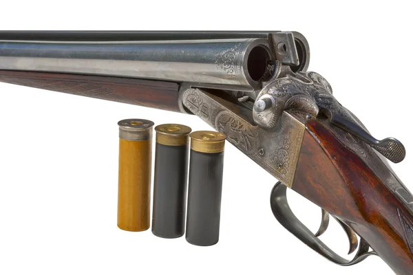 Double-barreled old shotgun and cartridges closeup — Stock Photo, Image