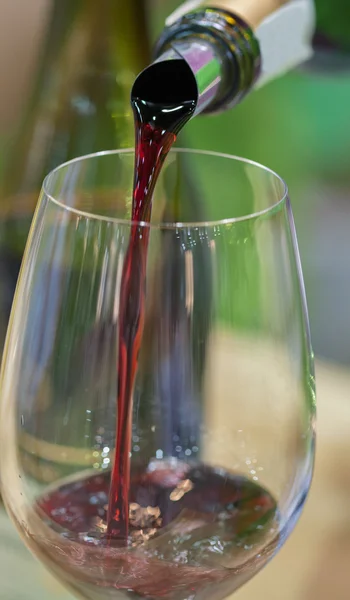 Pouring red wine for tasting — Stock Photo, Image