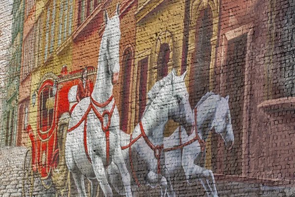 Coach and white horses street graffiti