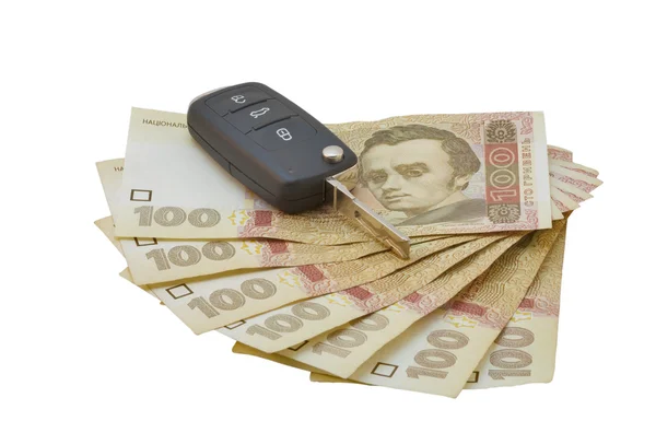 Car keys over Ukrainian banknotes — Stock Photo, Image