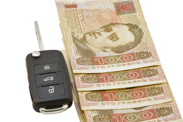 Car keys over Ukrainian banknotes — Stock Photo, Image