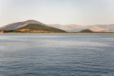 Seascape with Makrigiali and Drepano beaches, archaeological site of Pyrgos Rayos in the distance, close to Igoumenitsa, Greece