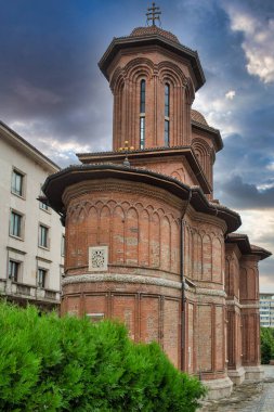 Dramatic sky view over Kretzulescu Church in Bucharest, Romania
