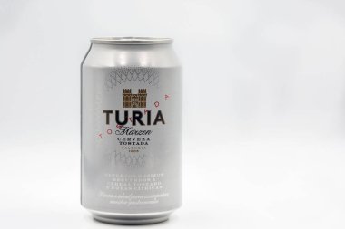 Kyiv, Ukraine - June 10, 2021: Studio shoot of Spanish Valencian beer Turia Marzen can from manufacturer Cervezas El Turia Damm closeup on white.