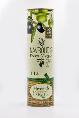 Corfu, Greece - August 05, 2021: Studio shoot of Mavroudis Corfu Family Extra Virgin Olive Oil unfiltered tin closeup on white.