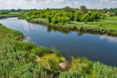 Drone aerial view over summer sunset river Ros landscape, Ukraine.